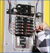 <img src="electrical panel.jpg" alt="electrical panel with breakers" />